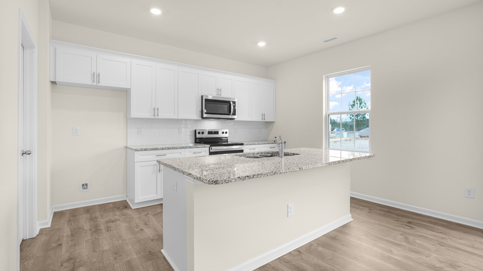 Kitchen with stainless-steel appliances