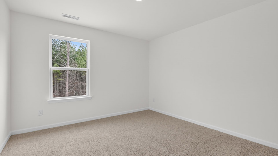 Bedroom with carpet floor and closet
