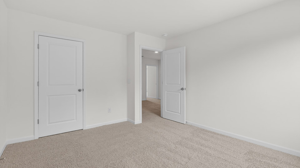 Bedroom with carpet floor and closet