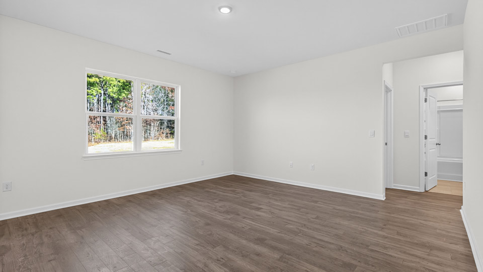 open concept living space with large windows