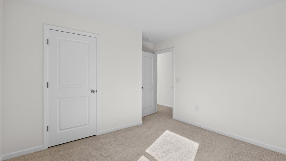 Bedroom with carpet floor and closet