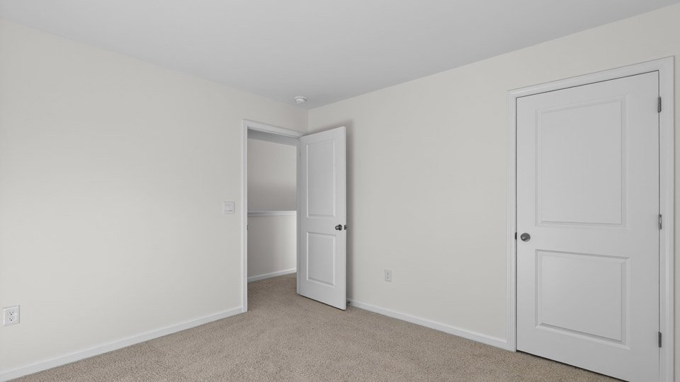 Bedroom with carpet floor and closet