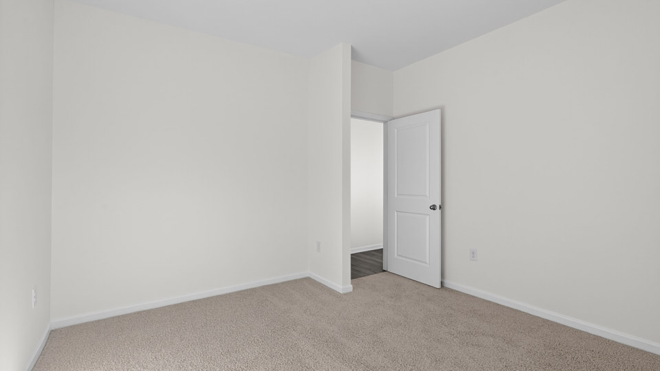 Bedroom with carpet floor and closet