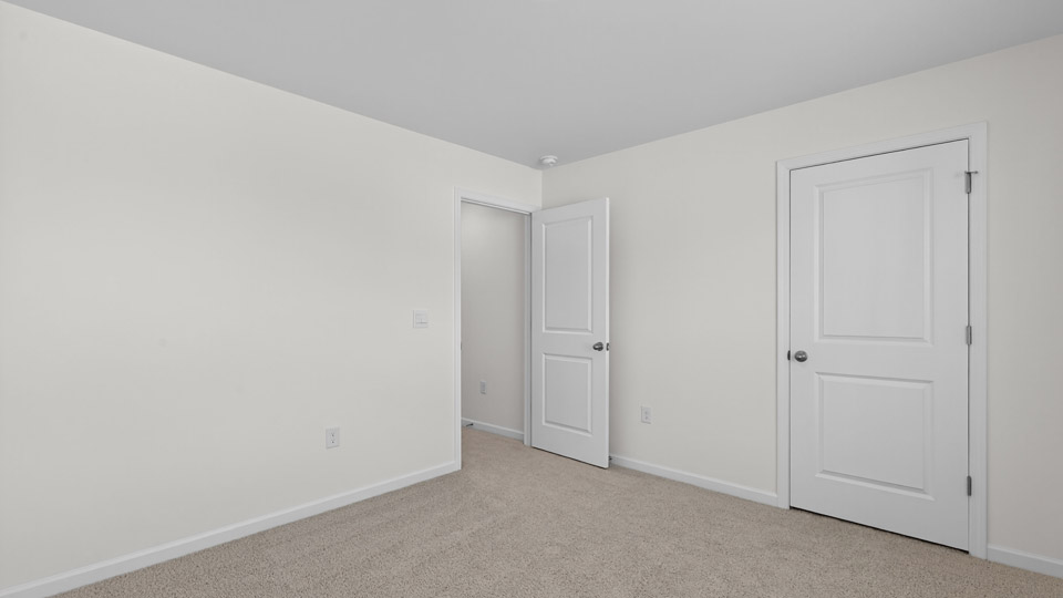 Bedroom with carpet floor and closet