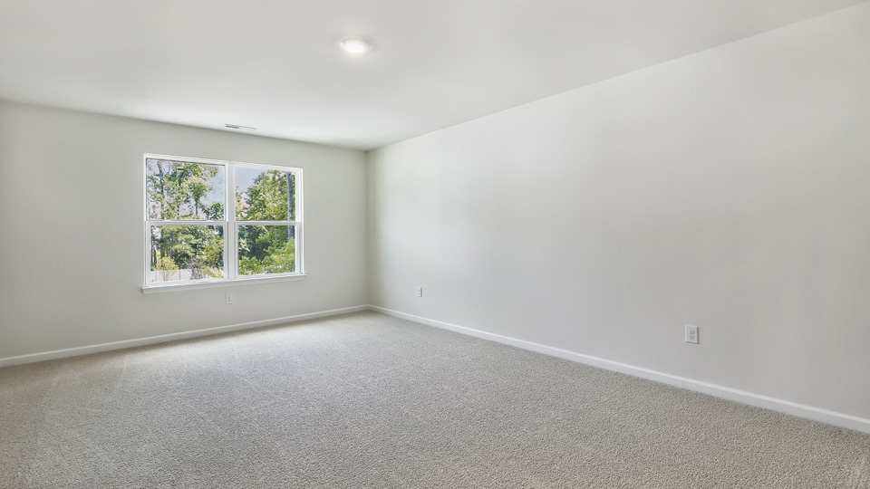 Bedroom with carpet