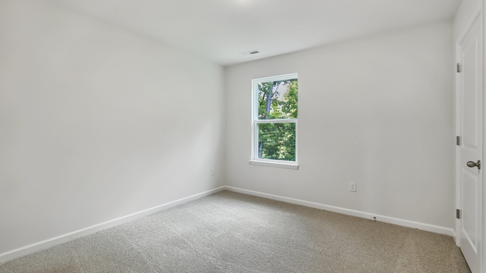 Bedroom with carpet