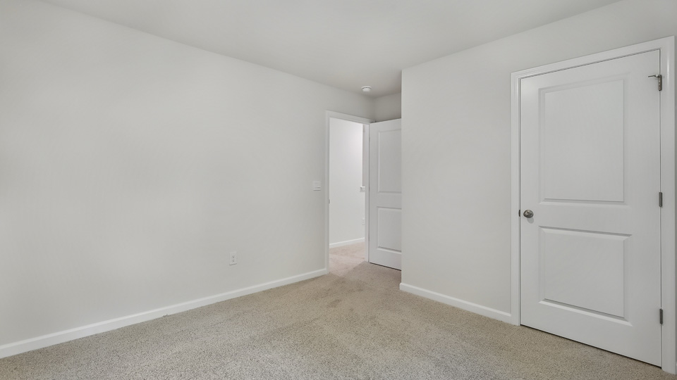 Bedroom with carpet