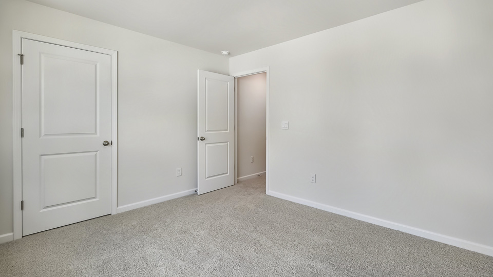 Bedroom with carpet