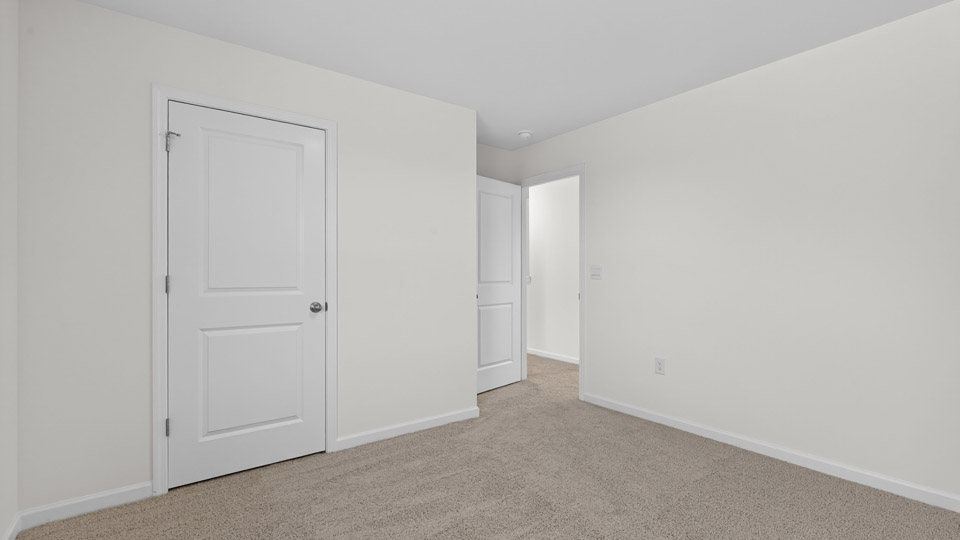 Bedroom with carpet floor and closet