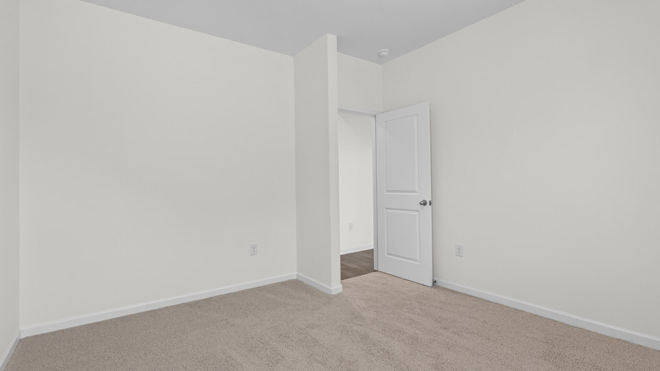 Bedroom with carpet floor and closet
