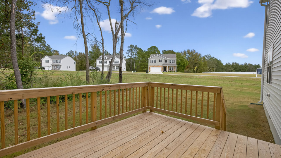 deck with large yard