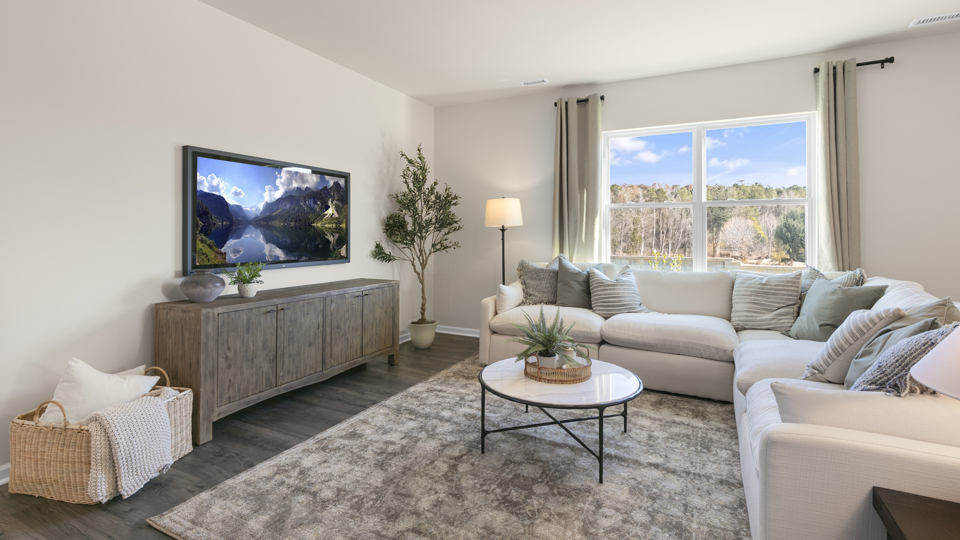 open concept living space with large windows