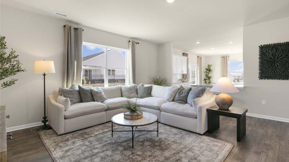 open concept living space with large windows