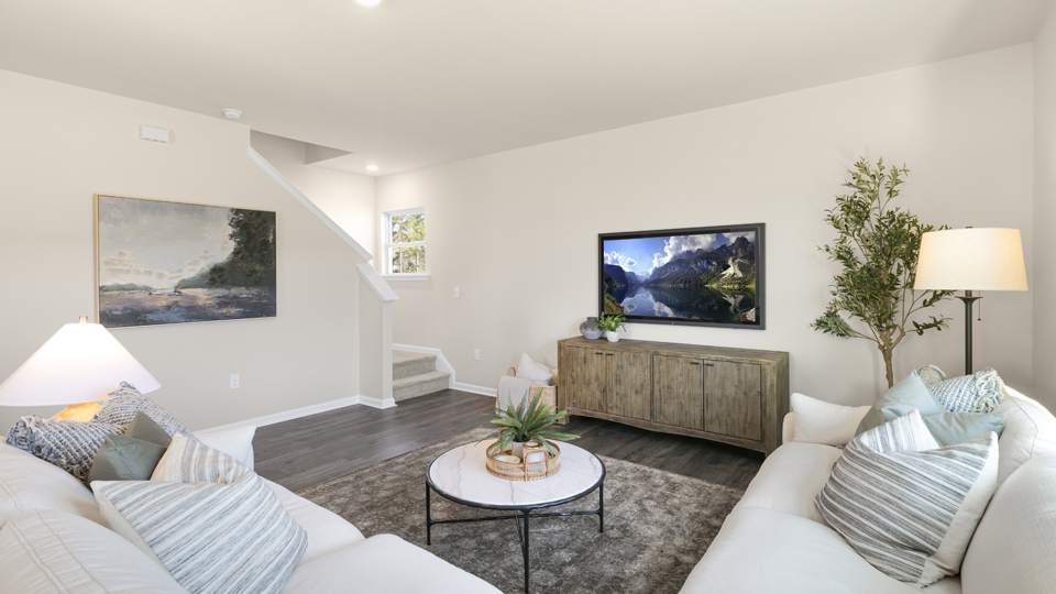 open concept living space with large windows