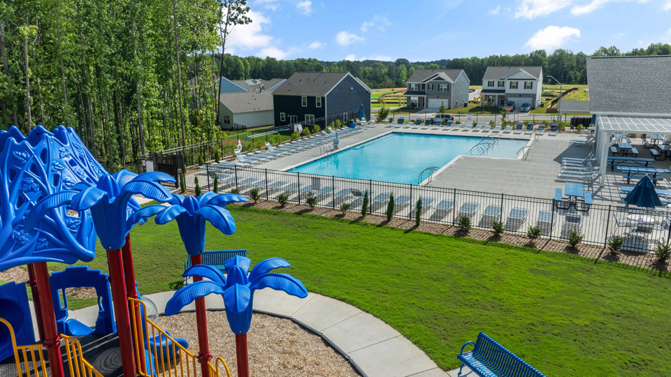 aerial photo of community pool and playground