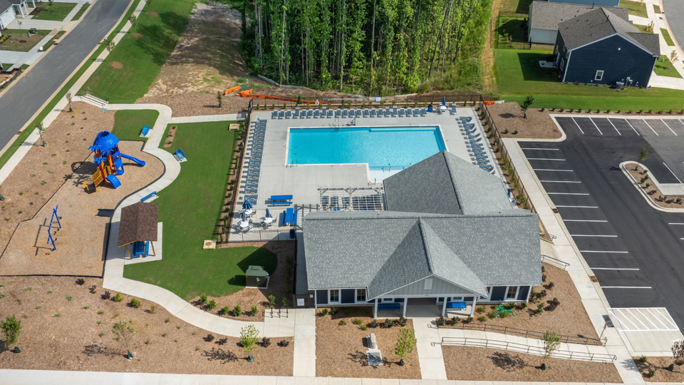 aerial photo of community pool and playground