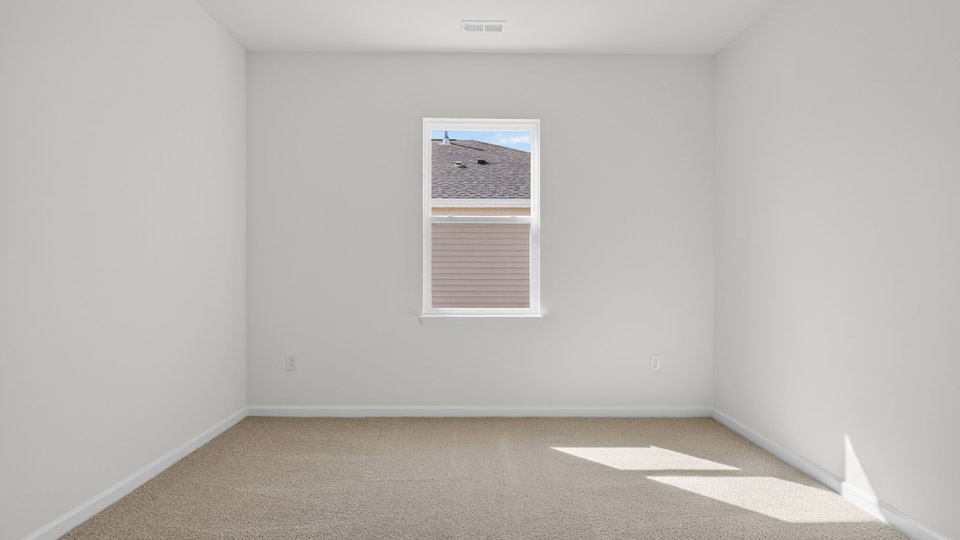 additional bedroom with window, carpeting, closet