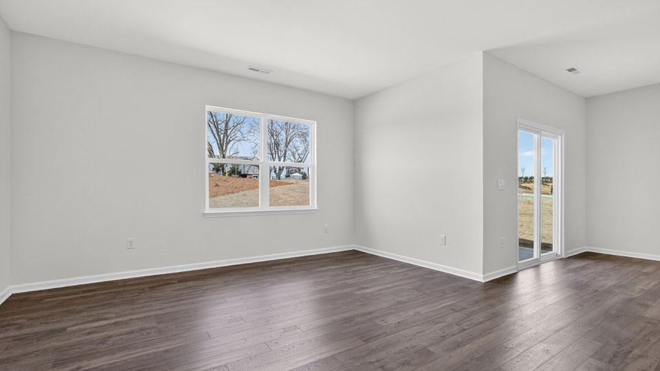open concept living space with large windows