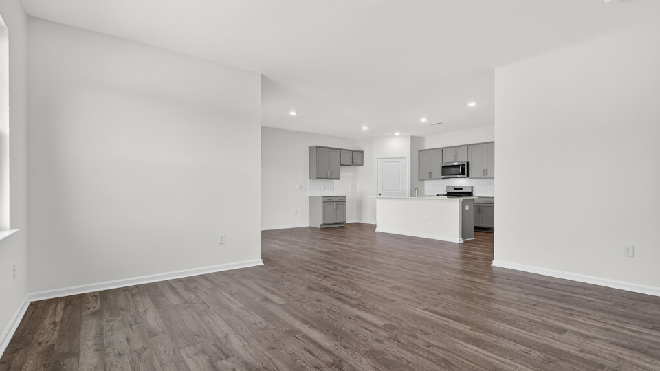 open concept living space with large windows