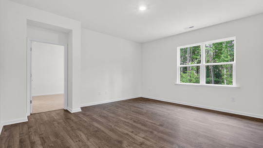 open concept living space with large windows