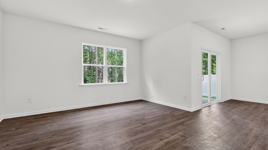 open concept living space with large windows