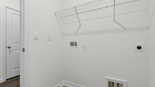 laundry room with wire shelving