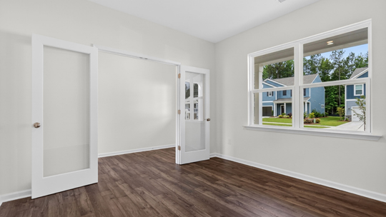 study with revwood flooring and french doors