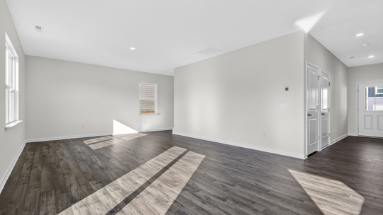 living room with revwood flooring