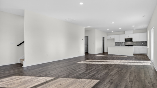 kitchen overlooking dining and living areas