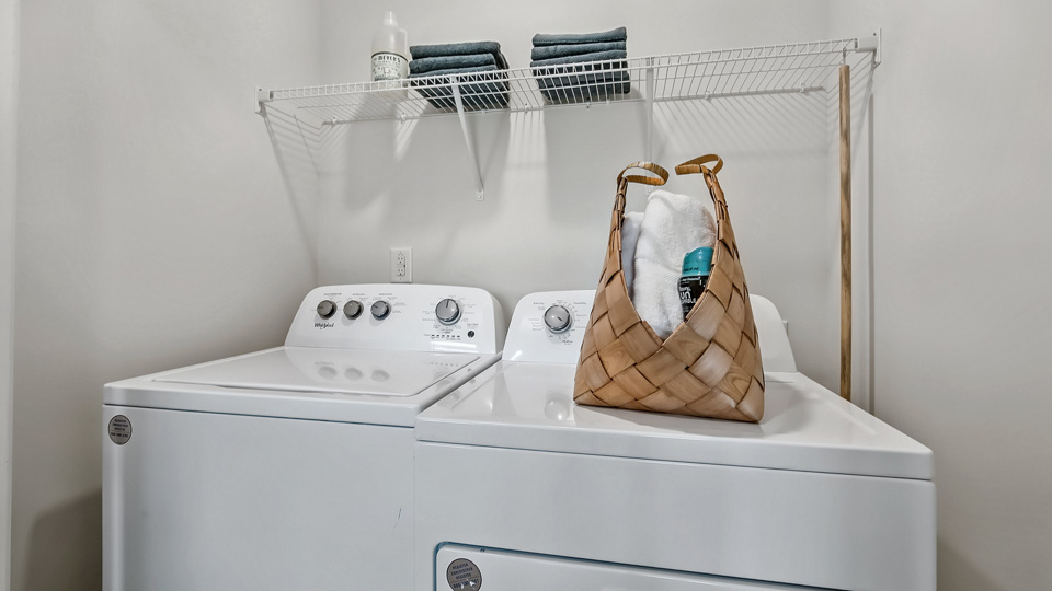 laundry room with wire shelving