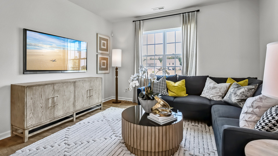 open concept living space with large windows