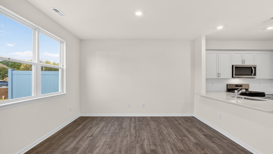 living room with revwood flooring