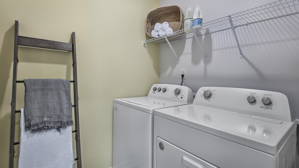 laundry room with wire shelving