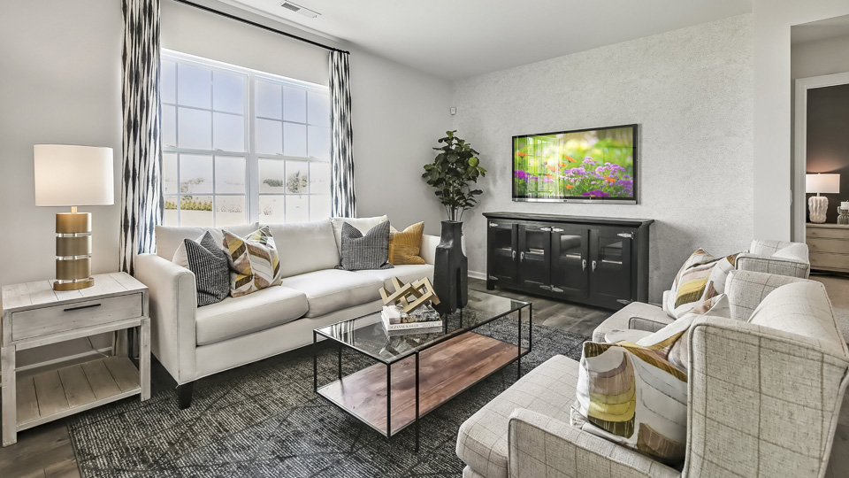 open concept living space with large windows