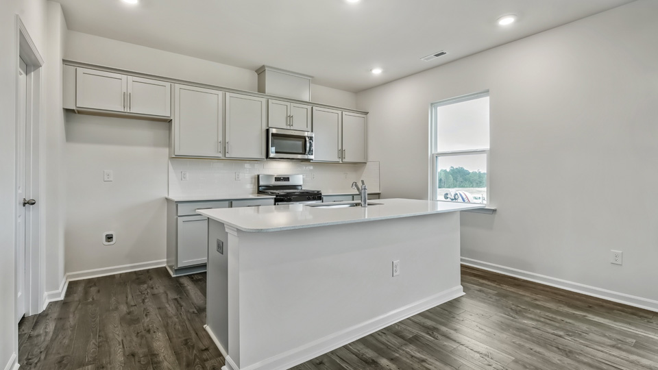 Kitchen with grey cabinets