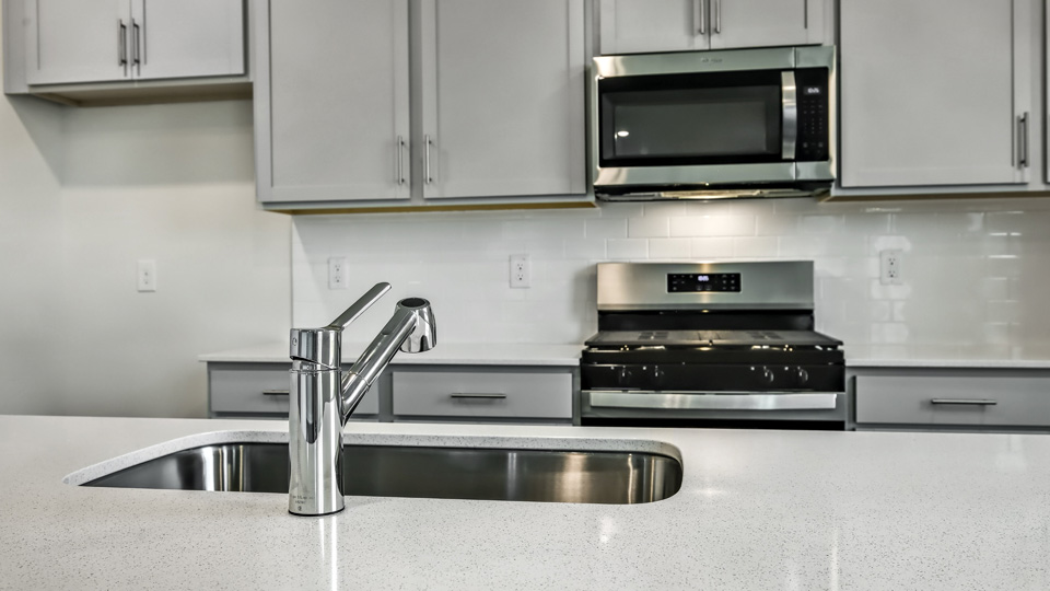 Kitchen with grey cabinets
