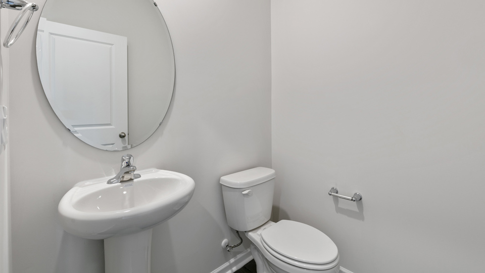 Bathroom with white cabinets