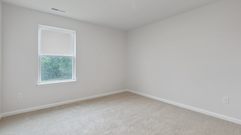 Bedroom with carpet
