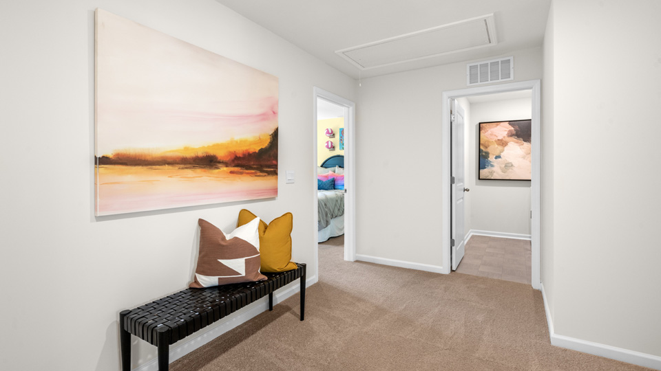 Hallway with carpet flooring