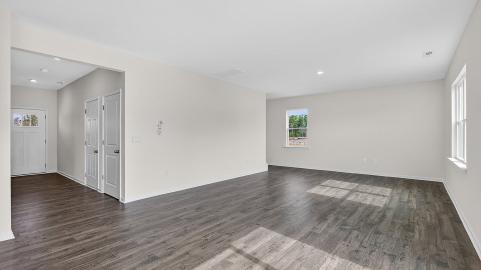 open concept living space with large windows