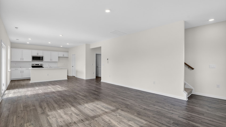open concept living space with large windows