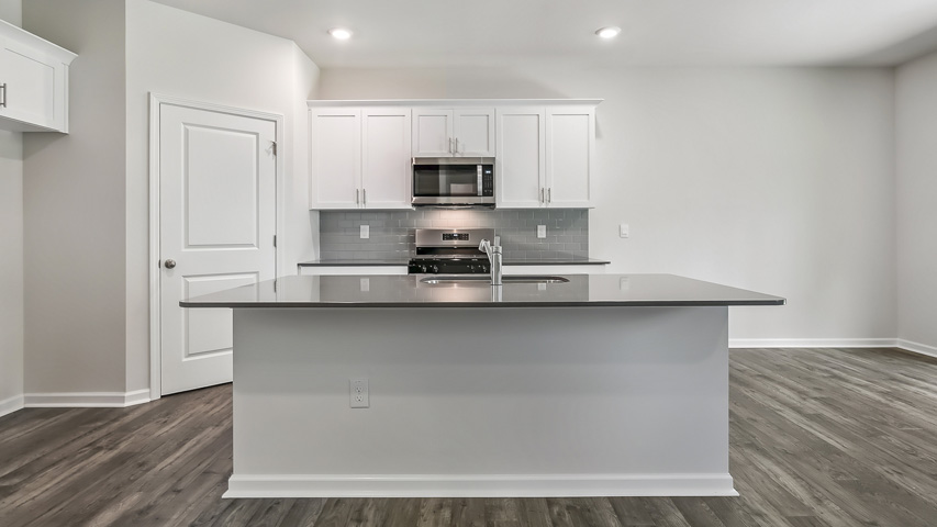 Kitchen with white cabinets