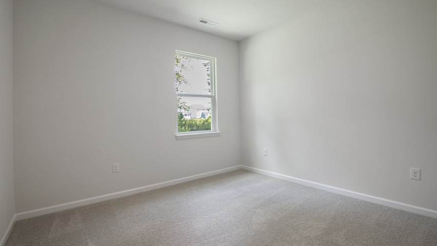 Bedroom with carpet