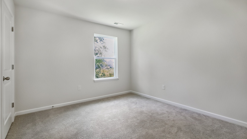 Bedroom with carpet