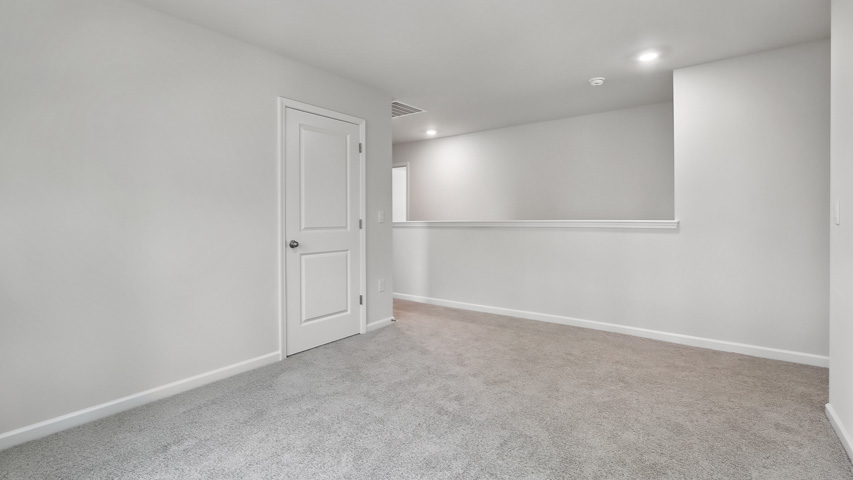 Loft area with carpet