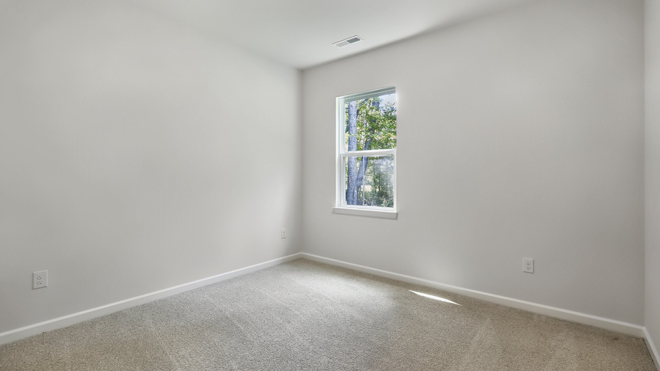Bedroom with carpet flooring