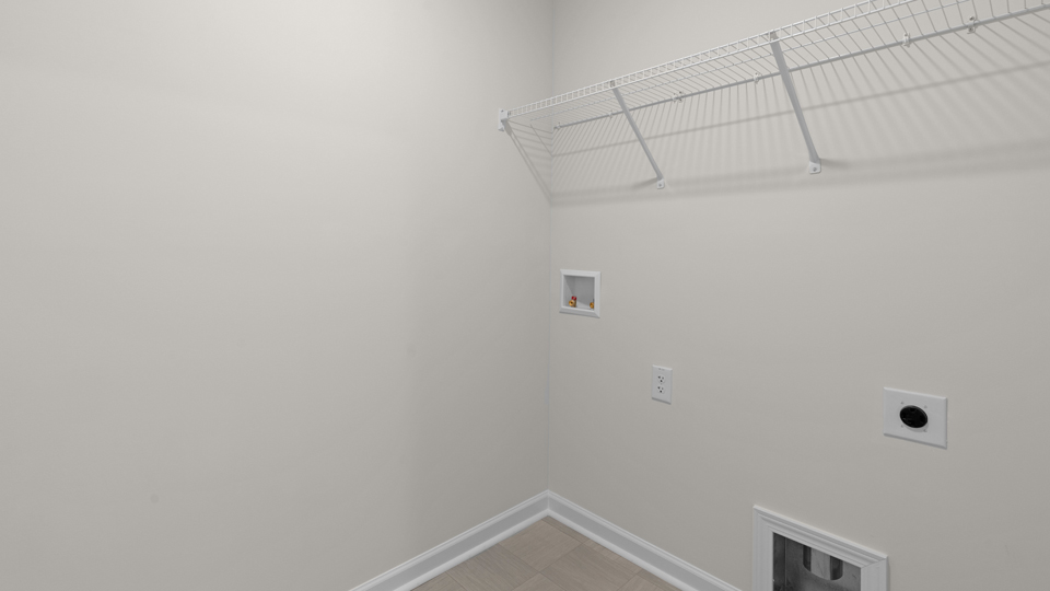 laundry room with wire shelving