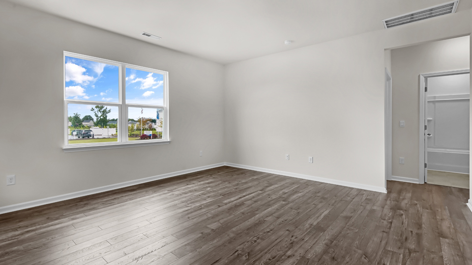 open concept living space with large windows