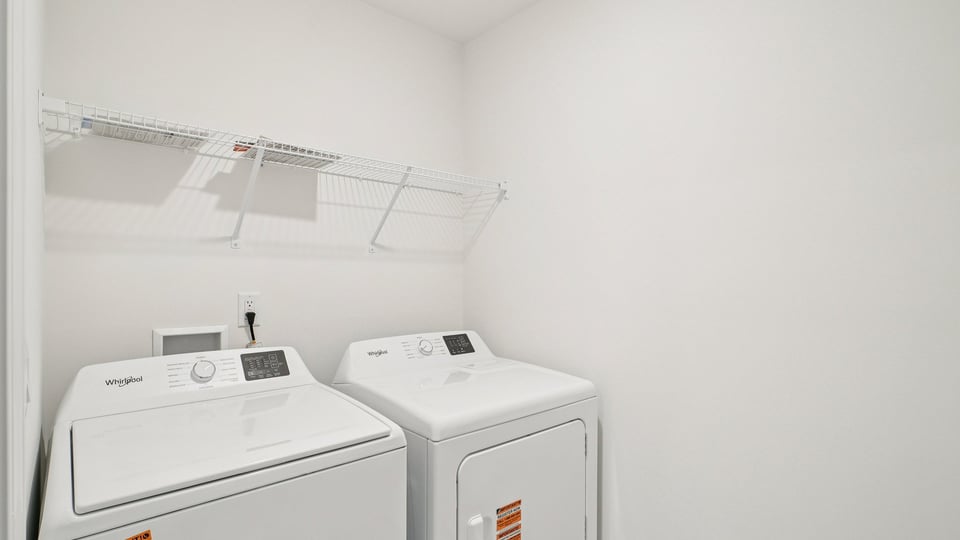 laundry room with wire shelving
