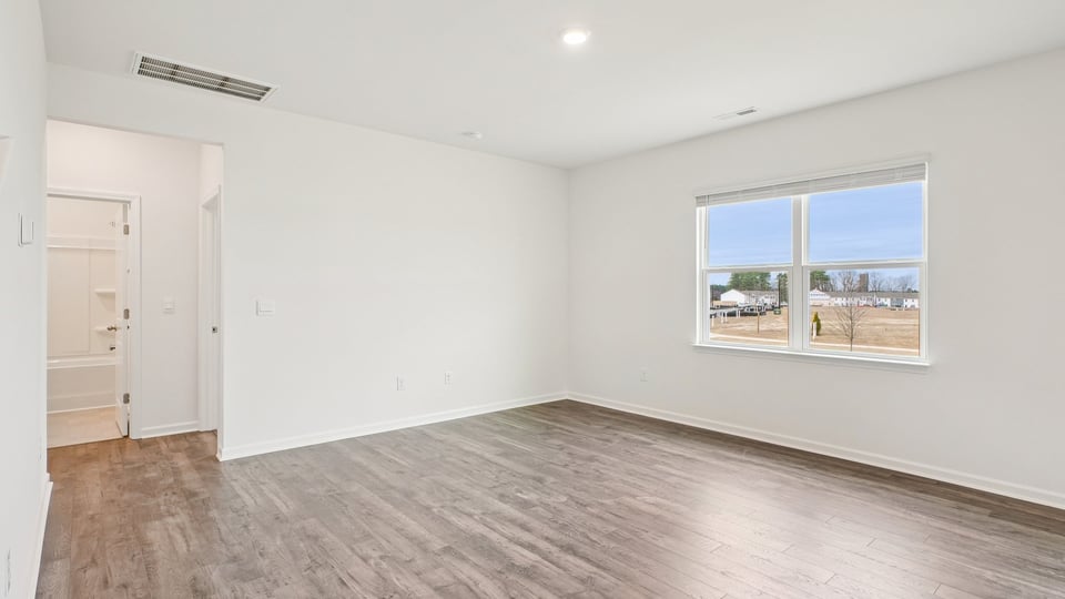 open concept living space with large windows